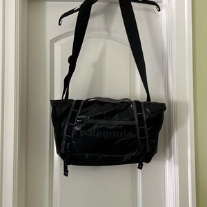 Patagonia Black Hole briefcase cross body bag in black